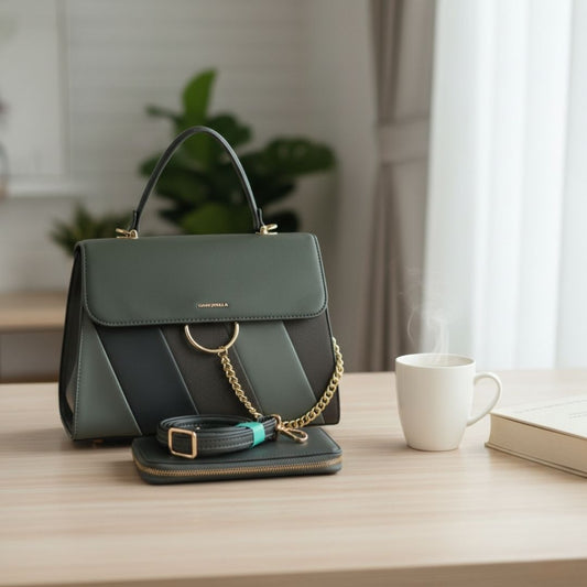 Green handbag on a wooden surface with a cup and book in the background
