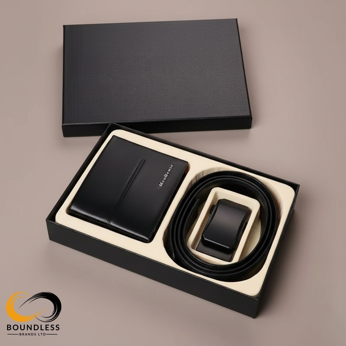 Black leather wallet and belt set in a box on a beige background