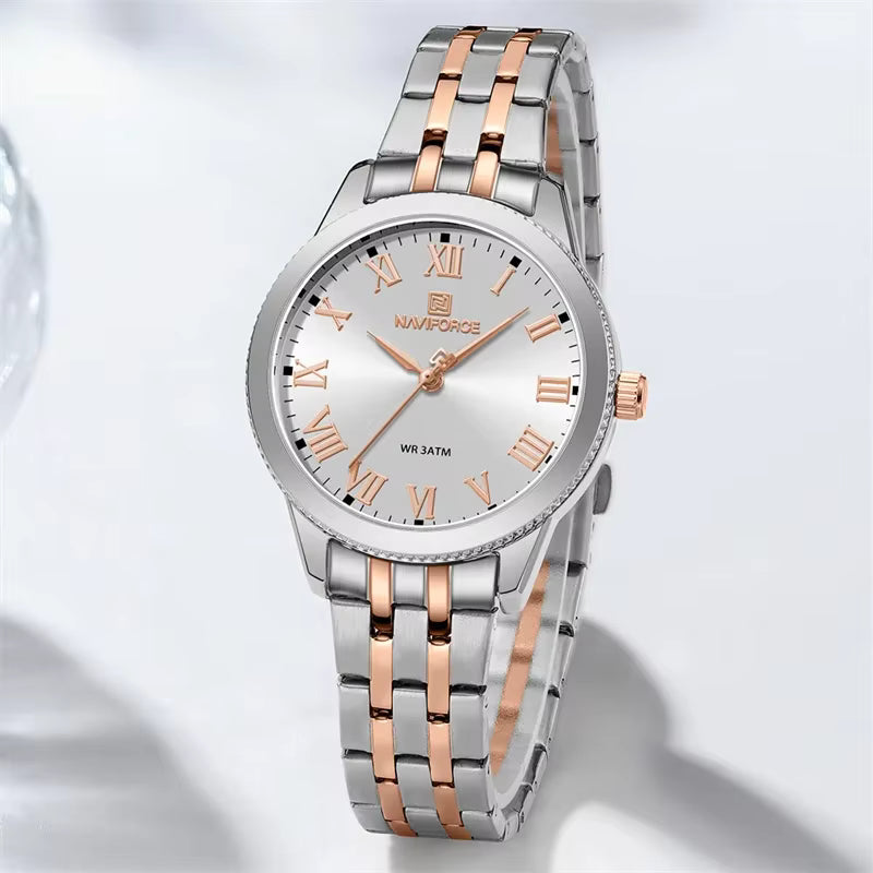 Silver and rose gold watch with Roman numeral markers on a light gray background