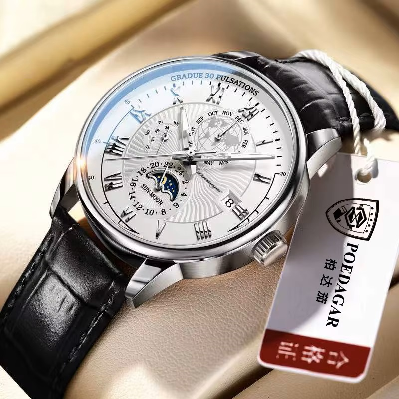 Luxury watch with black leather strap and visible brand tag on a neutral background