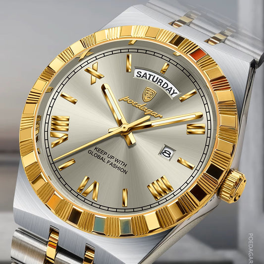 Gold and silver watch with detailed face on a gray background