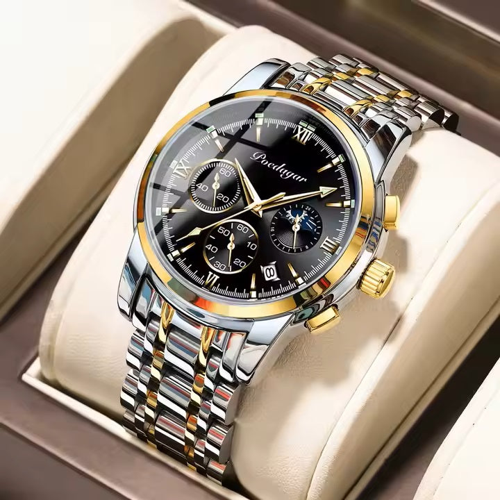 Luxury watch with gold and silver band on a beige cushion