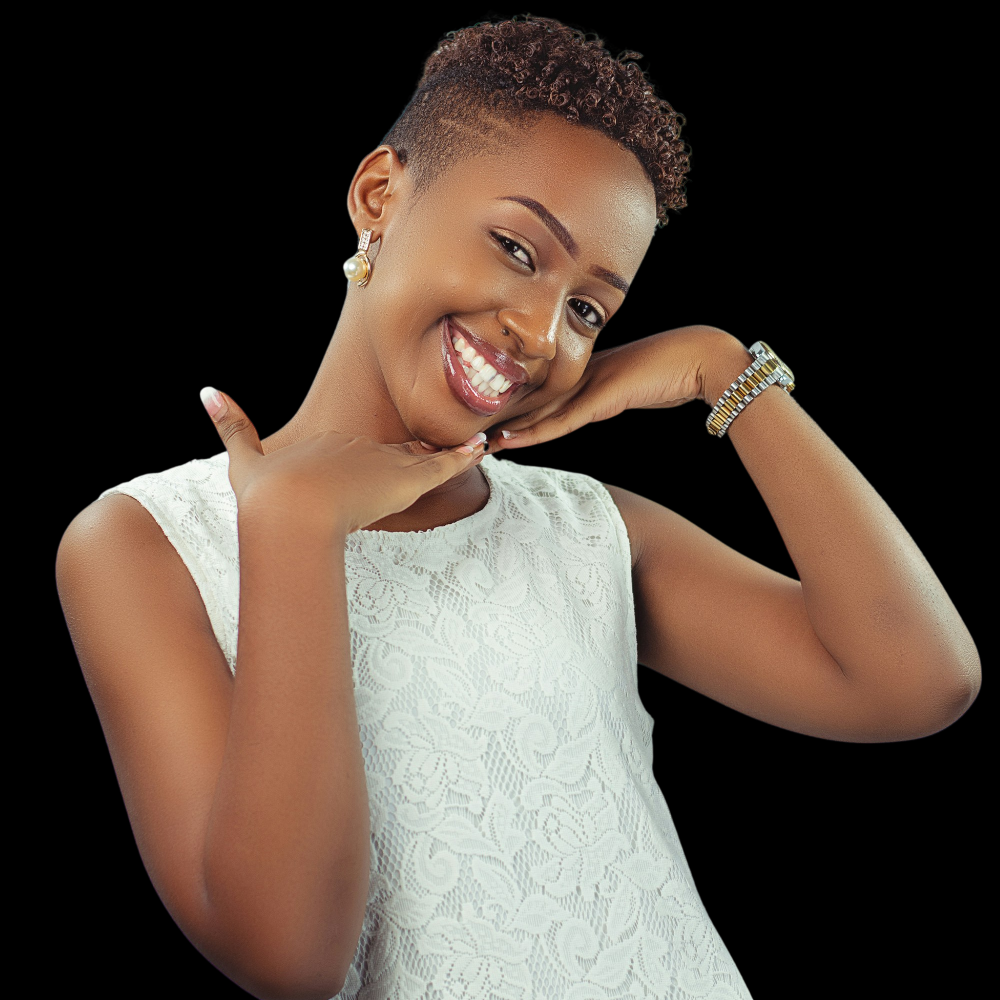 Woman in a white dress posing with a black background