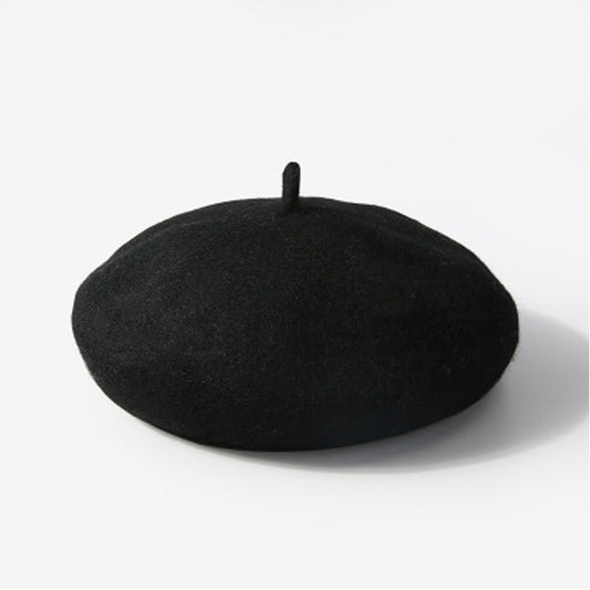 Black beret on a white background