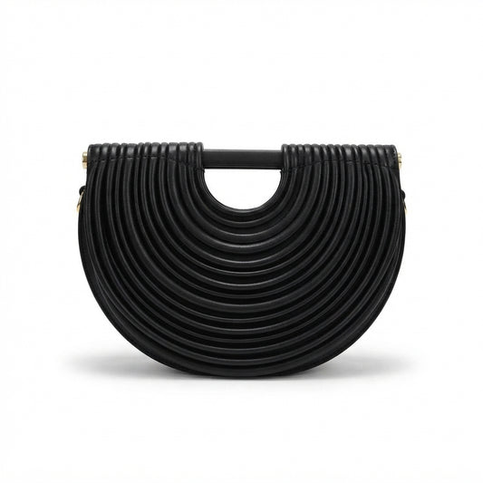 A black leather crescent-shaped handbag with a unique concentric circular pleated design and a top handle, shown on a plain white background.