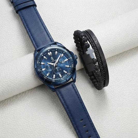 A men's watch with a blue leather strap and blue dial, styled next to a black braided leather bracelet on a white textured surface.